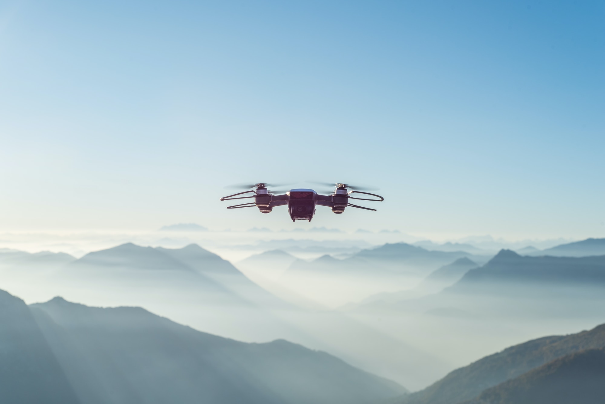 IoT drone used in the sky above mountains