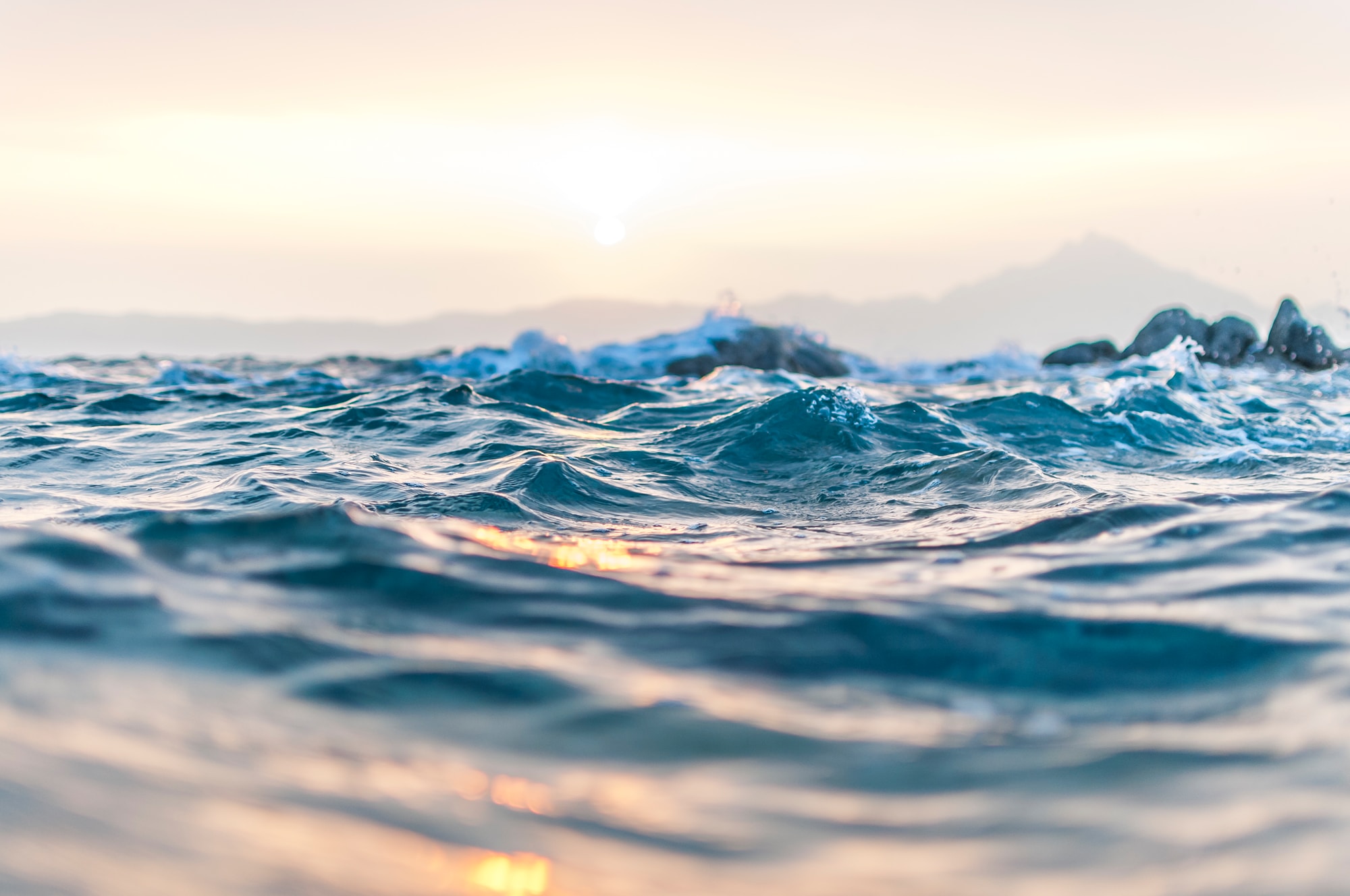 Sunrise over the waves in Greece