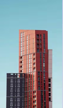 Skyscraper image on blue gradient background